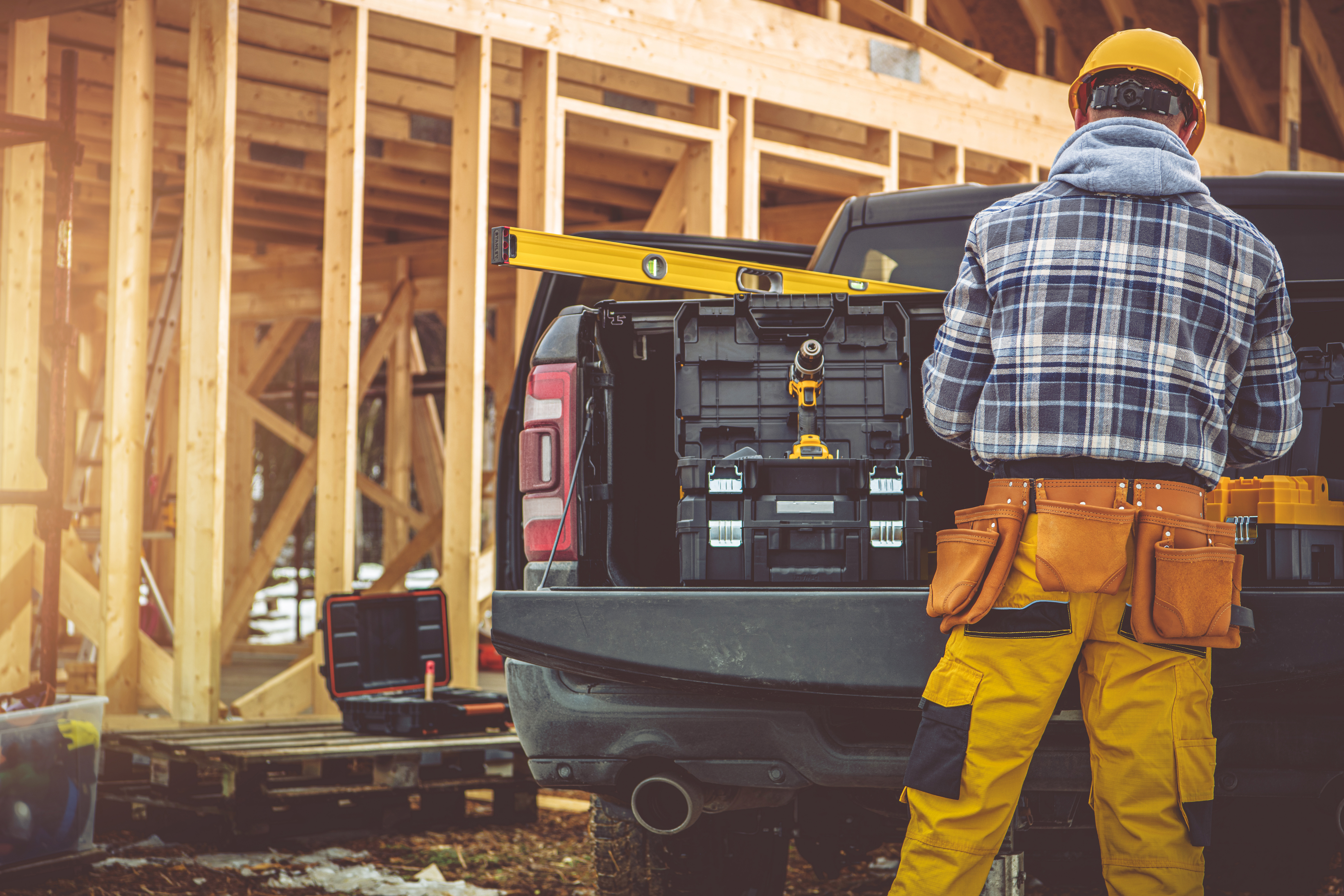 Contractor loading tools at a New Jersey remodeling jobsite